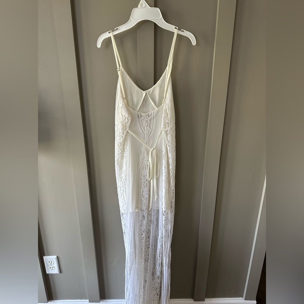 For love and lemons white dress. Originally $300 worn once